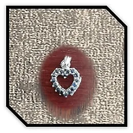 PE00750C-9ct White Gold Sapphire Heart Pendant.